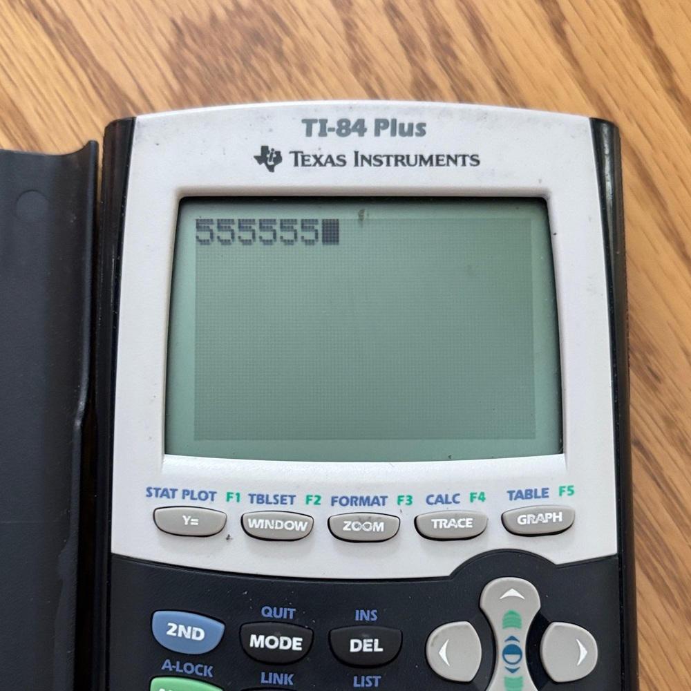 Texas Instruments TI-84 Plus Graphing Calculator - Black and Silver - Picture 2 of 3
